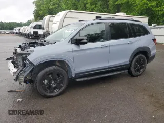 2022 Honda Pilot TrailSport z VIN 5FNYF6H81NB020409, wystawiony jako Copart lot #56401885 z przebiegiem 28 744 mil mil oraz Szkoda całkowita • Salvage title. Historia ofert i sprzedaży dostępna na DreamBid. Obrazek 1.