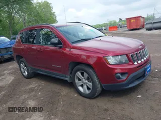 2014 Jeep Compass Sport with VIN 1C4NJDBB8ED799048, listed as a IAAI auction lot 39434584 with 119,507 mi miles. Bid and sale history available at carsss.com. Image 1.
