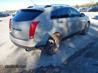 2011 Cadillac SRX Performance Collection with VIN 3GYFNBEY3BS529406, listed as a IAAI auction lot 40926089 with 160,535 mi miles. Bid and sale history available at carsss.com. Image 4.