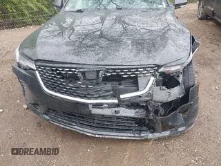 2023 Cadillac CT4 Premium Luxury z VIN 1G6DF5RK5P0109147, wystawiony jako IAAI lot #42124505 z przebiegiem 13 797 mil mil oraz . Historia ofert i sprzedaży dostępna na DreamBid. Obrazek 6.