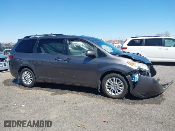 2015 Toyota Sienna XLE with VIN 5TDYK3DC4FS634937, listed as a IAAI auction lot 41869781 with 65,561 mi miles and . Bid and sale history available at carsss.com. Image 13.