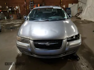 1999 Chrysler Cirrus LXi z VIN 1C3EJ56H5XN516255, wystawiony jako Copart lot #48552575 z przebiegiem 69 616 mil mil oraz Szkody całkowita. Historia ofert i sprzedaży dostępna na DreamBid. Obrazek 5.
