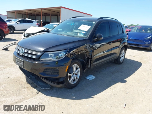 2015 Volkswagen Tiguan SE with VIN WVGAV7AX1FW558855, listed as a IAAI auction lot 42064427 with 58,584 mi miles and . Bid and sale history available at DreamBid. Image 17.