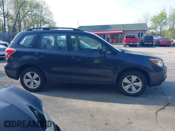2015 Subaru Forester 2.5i with VIN JF2SJABCXFH599231, listed as a IAAI auction lot 42166220 with 60,409 mi miles and . Bid and sale history available at DreamBid. Image 14.