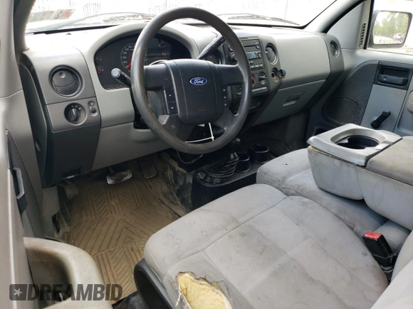 2006 Ford F-150 STX with VIN 1FTRX14W36NB54625, listed as a Copart auction lot 58221215 with 219,195 mi miles and Salvage title. Bid and sale history available at DreamBid. Image 8.