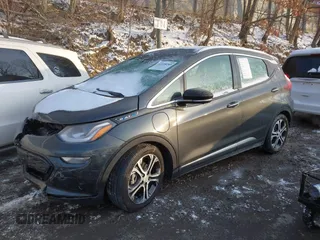 2021 Chevrolet Bolt EV Premier z VIN 1G1FZ6S09M4113694, wystawiony jako IAAI lot #41378289 z przebiegiem 40 979 mil mil oraz . Historia ofert i sprzedaży dostępna na DreamBid. Obrazek 2.