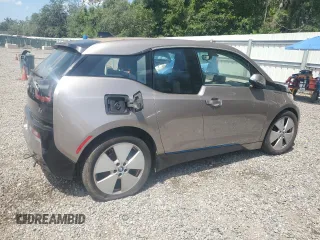 2014 BMW i3 with VIN WBY1Z4C50EVX63041, listed as a Copart auction lot 57907405 with 97,854 mi miles and Clean title. Bid and sale history available at DreamBid. Image 3.