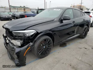 2021 BMW X6 sDrive40i with VIN 5UXCY4C00M9F88834, listed as a Copart auction lot 73198794 with 31,938 mi miles and Clean Title. Bid and sale history available at carsss.com. Image 1.