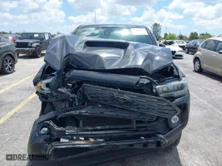 2020 Toyota Tacoma 2WD SR5 with VIN 3TMAZ5CN7LM129496, listed as a IAAI auction lot 39945333 with 140,154 mi miles. Bid and sale history available at carsss.com. Image 6.