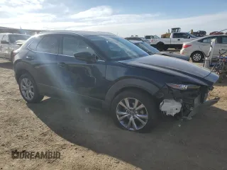 2021 Mazda CX-30 Premium with VIN 3MVDMBDL9MM264017, listed as a Copart auction lot 48625975 with 41,480 mi miles and Salvage Title. Bid and sale history available at DreamBid. Image 4.