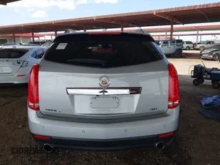 2012 Cadillac SRX Performance Collection with VIN 3GYFNEE36CS636375, listed as a IAAI auction lot 41939943 with Not Provided miles. Bid and sale history available at carsss.com. Image 16.