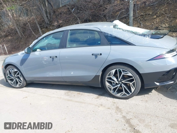 2024 Hyundai Ioniq 6 SEL z VIN KMHM34AC0RA076572, wystawiony jako IAAI lot #42188178 z przebiegiem 1 828 mil mil oraz . Historia ofert i sprzedaży dostępna na DreamBid. Obrazek 14.