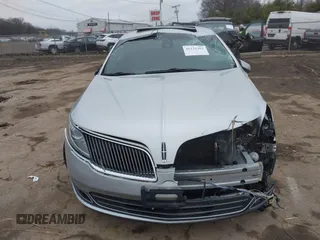 2013 Lincoln MKS EcoBoost with VIN 1LNHL9FT9DG611640, listed as a IAAI auction lot 41131303 with 135,550 mi miles and . Bid and sale history available at DreamBid. Image 12.