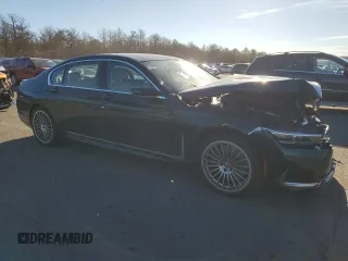 2022 BMW 7 Series with VIN WBA7U2C11NCJ22940, listed as a Copart auction lot 87848125 with 37,023 mi miles and Salvage title. Bid and sale history available at DreamBid. Image 4.