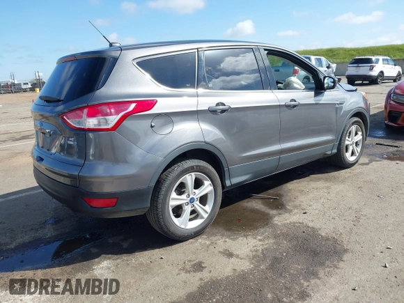 2014 Ford Escape SE with VIN 1FMCU9G96EUA06567, listed as a IAAI auction lot 41954345 with 88,294 mi miles and . Bid and sale history available at DreamBid. Image 4.