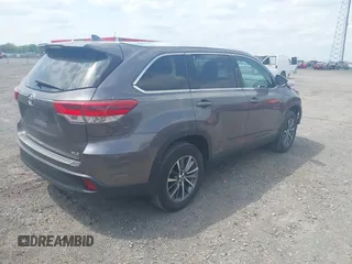 2019 Toyota Highlander SE with VIN 5TDKZRFH3KS353087, listed as a IAAI auction lot 42006593 with 74,214 mi miles and . Bid and sale history available at DreamBid. Image 4.