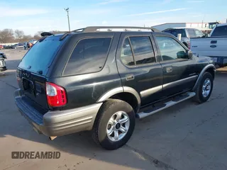 2002 Isuzu Rodeo S with VIN 4S2CK58WX24339782, listed as a IAAI auction lot 41340277 with 154,240 mi miles. Bid and sale history available at carsss.com. Image 4.
