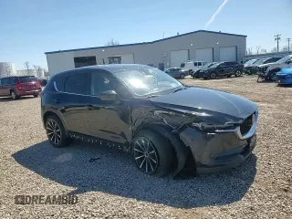 2018 Mazda CX-5 Grand Touring with VIN JM3KFBDM0J0434704, listed as a Copart auction lot 53732715 with Not Provided miles and Salvage Title. Bid and sale history available at DreamBid. Image 12.