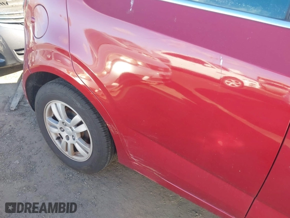 2014 Chevrolet Sonic LT with VIN 1G1JC6SH6E4215294, listed as a IAAI auction lot 41282441 with 107,583 mi miles. Bid and sale history available at carsss.com. Image 12.