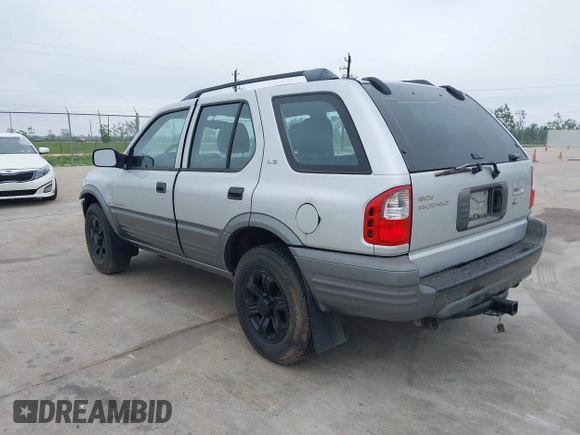 2000 Isuzu Rodeo S with VIN 4S2CK58W3Y4308219, listed as a IAAI auction lot 41939765 with 241,486 mi miles and . Bid and sale history available at DreamBid. Image 3.