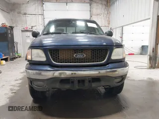 2003 Ford F-150 XLT z VIN 1FTRW08L73KC11631, wystawiony jako IAAI lot #42673130 z przebiegiem 188 945 mil mil oraz . Historia ofert i sprzedaży dostępna na DreamBid. Obrazek 12.
