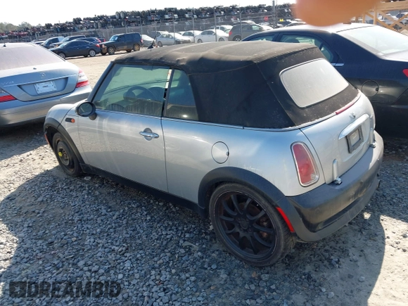 2006 MINI Convertible with VIN WMWRF33586TF64534, listed as a IAAI auction lot 41484453 with 180,748 mi miles and . Bid and sale history available at DreamBid. Image 3.