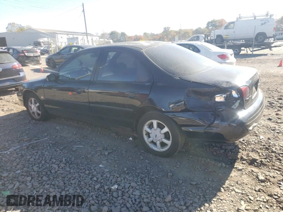 1996 Ford Contour z VIN 1FALP65L5TK212857, wystawiony jako Copart lot #76701614 z przebiegiem 74 994 mil mil oraz Szkody całkowita. Historia ofert i sprzedaży dostępna na DreamBid. Obrazek 2.