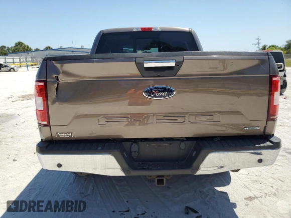 2018 Ford F-150 XL with VIN 1FTEW1CG4JKC38569, listed as a Copart auction lot 54779805 with 97,190 mi miles and Salvage Title. Bid and sale history available at carsss.com. Image 6.