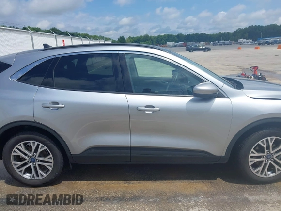 2021 Ford Escape SEL with VIN 1FMCU0H6XMUB20523, listed as a IAAI auction lot 42446320 with 37,681 mi miles and . Bid and sale history available at DreamBid. Image 14.