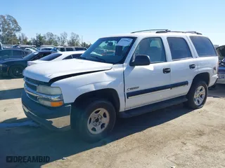 2001 Chevrolet Tahoe LT with VIN 1GNEC13T01J132932, listed as a IAAI auction lot 41398864 with 151,411 mi miles. Bid and sale history available at carsss.com. Image 2.