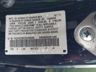 2012 Honda Civic Cpe EX-L with VIN 2HGFG3B02CH508296, listed as a IAAI auction lot 41739919 with 147,677 mi miles. Bid and sale history available at carsss.com. Image 9.