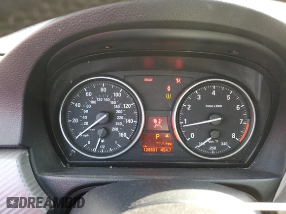 2010 BMW 3 Series 335i xDrive with VIN WBAPL3C57AA407952, listed as a Copart auction lot 85510004 with 128,631 mi miles and Salvage title. Bid and sale history available at DreamBid. Image 9.