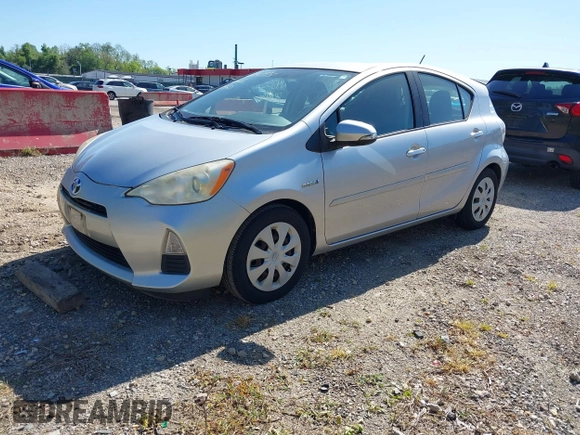 2013 Toyota Prius One with VIN JTDKDTB30D1047034, listed as a IAAI auction lot 42143557 with 186,866 mi miles. Bid and sale history available at carsss.com. Image 2.