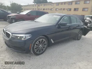 2020 BMW 5 Series 530i with VIN WBAJR3C00LWW70329, listed as a Copart auction lot 62140015 with 26,563 mi miles and Salvage title. Bid and sale history available at DreamBid. Image 1.