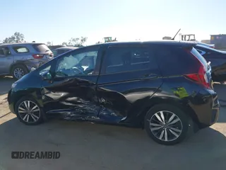 2016 Honda Fit EX with VIN JHMGK5H75GX006464, listed as a IAAI auction lot 41852218 with 30,990 mi miles and . Bid and sale history available at DreamBid. Image 14.
