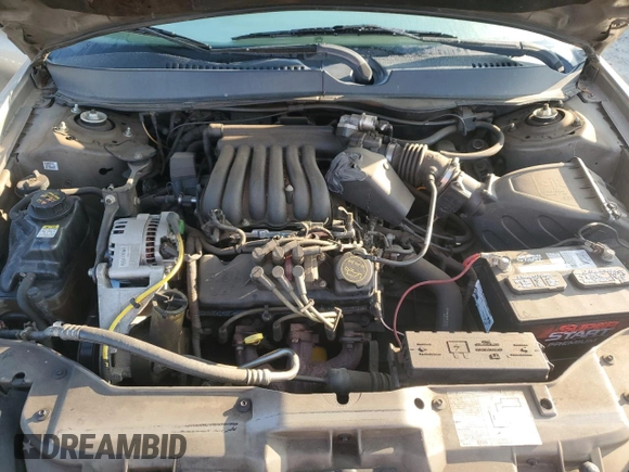2003 Ford Taurus z VIN 1FAFP52253A170456, wystawiony jako Copart lot #70009824 z przebiegiem 216 567 mil mil oraz Szkoda całkowita • Salvage title. Historia ofert i sprzedaży dostępna na DreamBid. Obrazek 11.