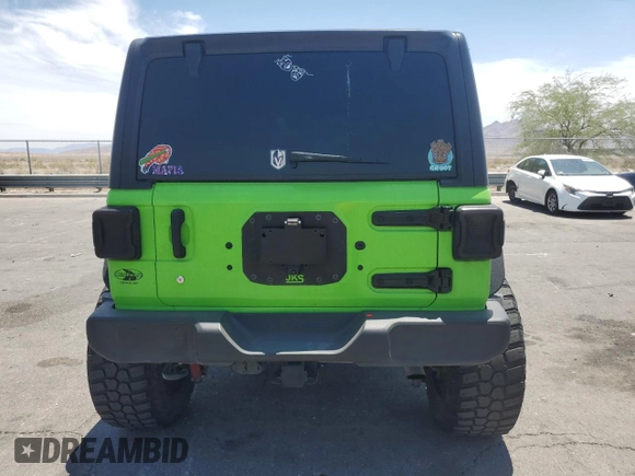 2018 Jeep Wrangler Unlimited Sport with VIN 1C4HJXDG7JW115516, listed as a Copart auction lot 58231735 with 52,992 mi miles and Salvage title. Bid and sale history available at DreamBid. Image 6.
