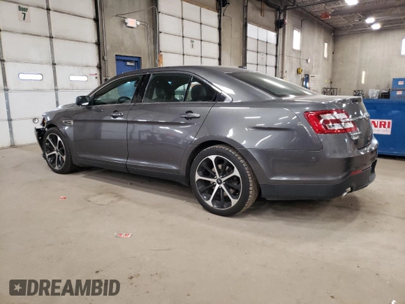 2015 Ford Taurus SEL with VIN 1FAHP2E81FG167546, listed as a Copart auction lot 49114795 with 185,587 mi miles and Salvage Title. Bid and sale history available at carsss.com. Image 2.