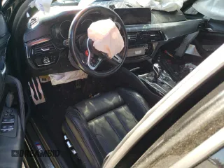 2018 BMW M5 z VIN WBSJF0C57JB283361, wystawiony jako Copart lot #65352164 z przebiegiem Nie podano mil oraz Szkoda całkowita • Salvage title. Historia ofert i sprzedaży dostępna na DreamBid. Obrazek 8.