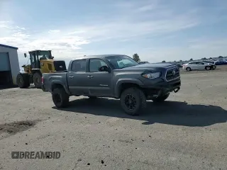 2017 Toyota Tacoma SR5 z VIN 3TMCZ5AN7HM094624, wystawiony jako Copart lot #58166405 z przebiegiem 84 877 mil mil oraz Szkoda całkowita • Salvage title. Historia ofert i sprzedaży dostępna na DreamBid. Obrazek 13.
