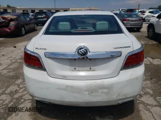 2013 Buick LaCrosse с VIN 1G4GA5E32DF180737, выставлен на аукционе Copart как лот 64054085 с пробегом 177 365 миль миль и Списание • Salvage title. История ставок и продаж доступна на DreamBid. Изображение 6.