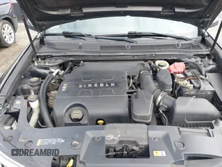 2014 Lincoln MKS with VIN 1LNHL9EK0EG601444, listed as a IAAI auction lot 41849160 with 164,791 mi miles. Bid and sale history available at carsss.com. Image 10.