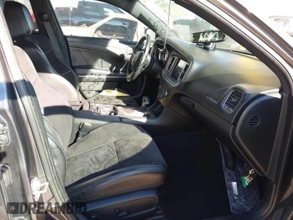 2019 Dodge Charger Scat Pack with VIN 2C3CDXGJ2KH564051, listed as a IAAI auction lot 41255283 with 64,687 mi miles and . Bid and sale history available at DreamBid. Image 5.