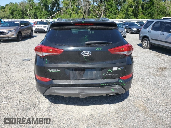 2016 Hyundai Tucson Sport with VIN KM8J33A26GU161089, listed as a Copart auction lot 52941915 with 190,392 mi miles and Salvage Title. Bid and sale history available at carsss.com. Image 6.