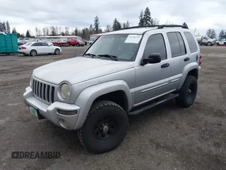 2002 Jeep Liberty Limited with VIN 1J4GL58K62W226966, listed as a IAAI auction lot 41700979 with 215,966 mi miles and . Bid and sale history available at carsss.com. Image 2.