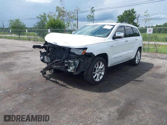 2014 Jeep Grand Cherokee Summit with VIN 1C4RJFJT6EC281114, listed as a IAAI auction lot 42497582 with 128,181 mi miles and . Bid and sale history available at DreamBid. Image 17.