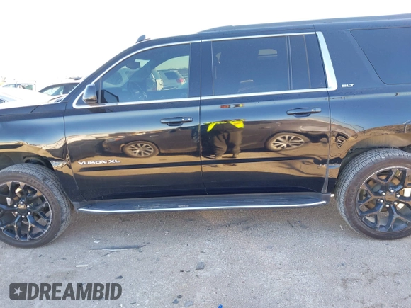 2019 GMC Yukon XL SLT with VIN 1GKS1GKC3KR380153, listed as a IAAI auction lot 41360225 with 152,304 mi miles. Bid and sale history available at carsss.com. Image 14.