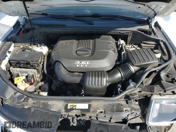 2014 Jeep Grand Cherokee Limited z VIN 1C4RJFBG0EC195248, wystawiony jako Copart lot #56353095 z przebiegiem 101 133 mil mil oraz Szkoda całkowita • Salvage title. Historia ofert i sprzedaży dostępna na DreamBid. Obrazek 12.