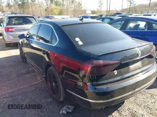 2016 Volkswagen Passat SE with VIN 1VWBT7A30GC049027, listed as a IAAI auction lot 41878460 with 125,261 mi miles and . Bid and sale history available at DreamBid. Image 3.