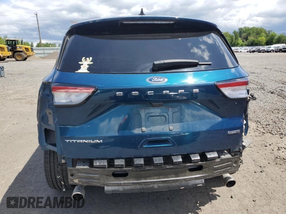 2020 Ford Escape Titanium Hybrid with VIN 1FMCU9DZ2LUC10252, listed as a Copart auction lot 56344755 with 31,382 mi miles and Salvage title. Bid and sale history available at DreamBid. Image 6.